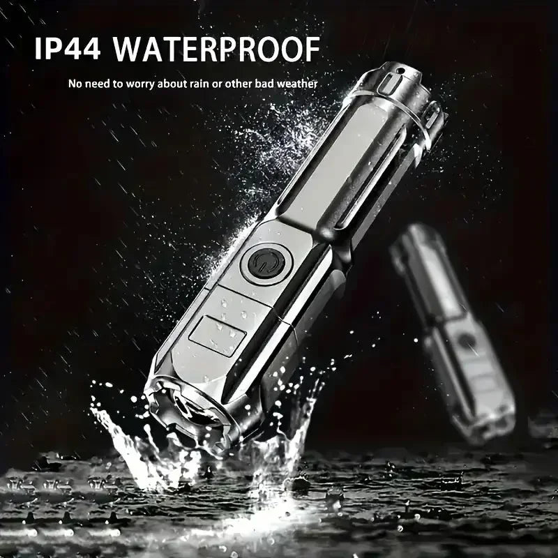 Rechargeable zoom LED torch, 100m beam, pocket size